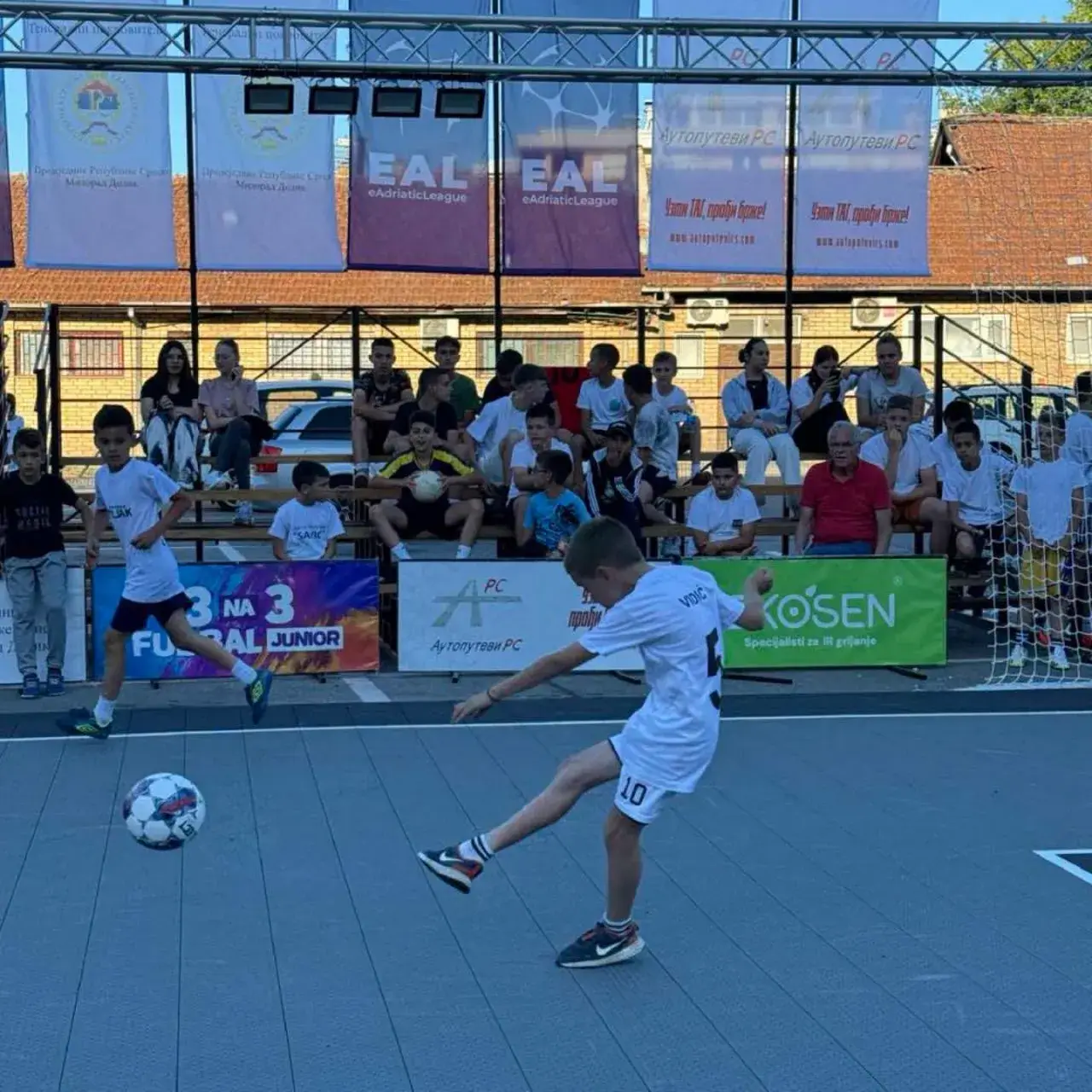 Players on stage during a finals match